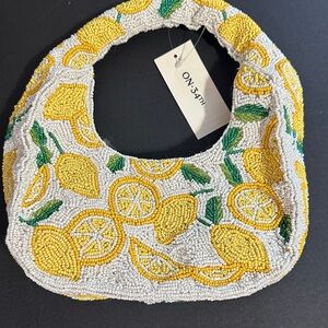 On 34th lemon beaded half moon shoulder bag